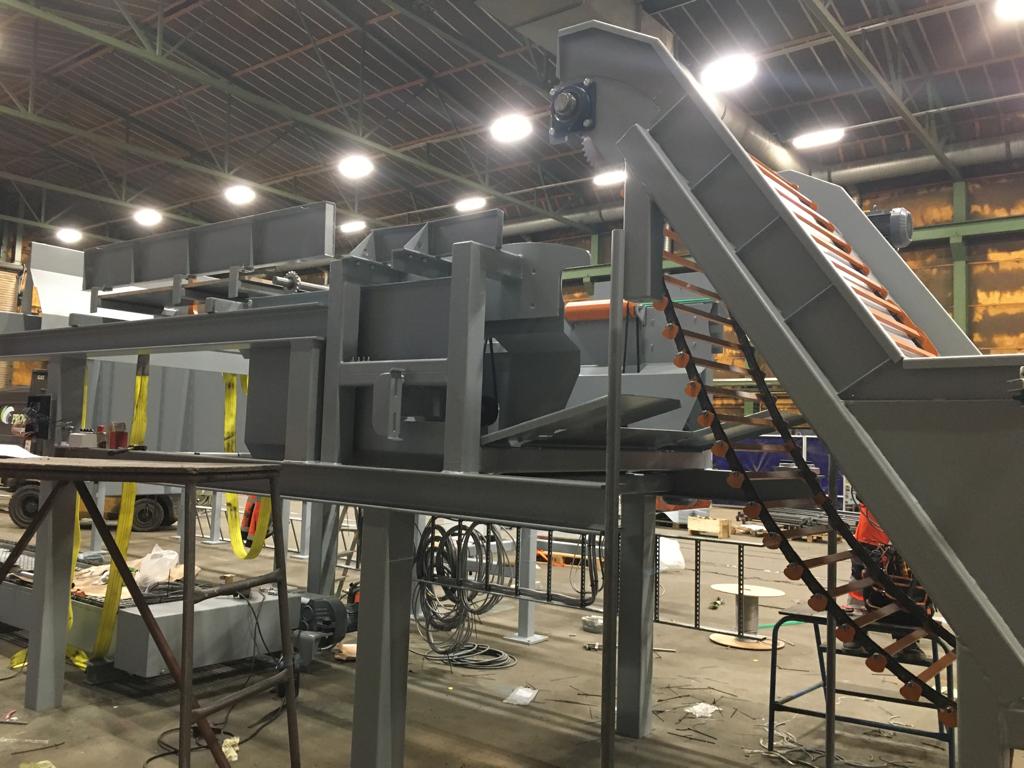 Stick handling - Stick feed machine
